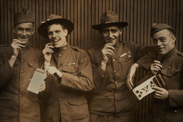 historic photo of soldiers eating chocolate